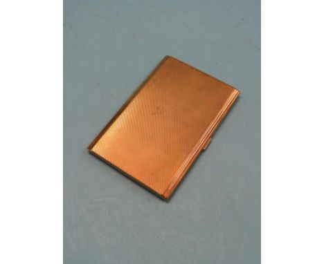 An engine-turned 9ct. gold cigarette case, personalised inscription, Birmingham 1957, 156.5 grams gross
