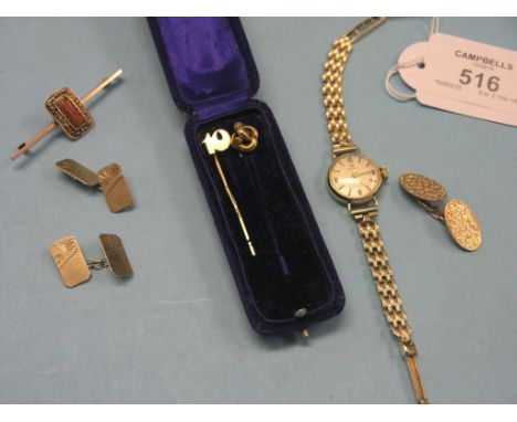 A lady's 9ct. gold Tissot wristwatch, on 9ct. gold bracelet strap, two yellow metal tie-pins, three 9ct. gold cuff-links and 