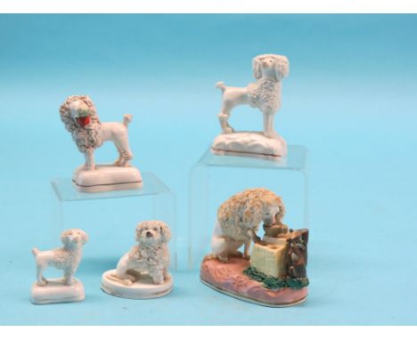 An unusual Victorian bone china drinking dog model, and four other Victorian ceramic dog models 