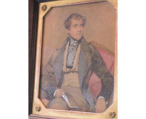 A 19th century watercolour, portrait of a young seated man, unsigned, 11 x 9in.
