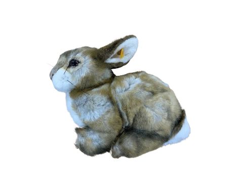 A 1980s/1990s Steiff bunny rabbit with gold ear button and yellow tag