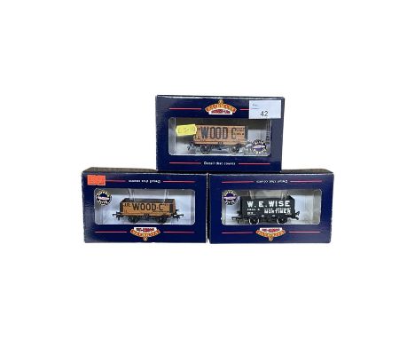 A trio of boxed Bachmann Branch-Line 00 gauge wagons, to include: - 37-100A 7 Plank Wagon 'W E Wise' - 37-053 5 Plank Wagon '