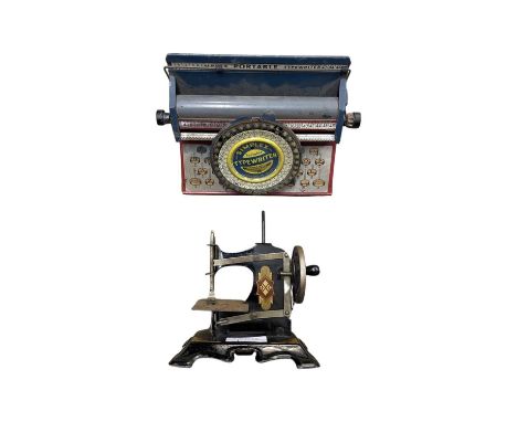 A vintage Simplex portable typewriter and an unmarked child's sewing machine (2)