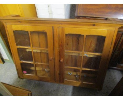 A modern pine wall hanging display unit 34"h x 39 1/2"w, along with a mid 20th century light oak desk , 29 1/2" x 53 1/4"w 