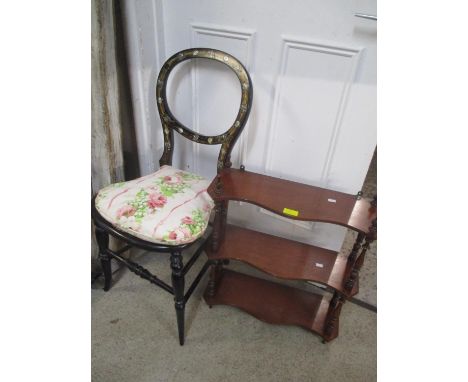 A Victorian black lacquered and mother of pearl inlaid balloon back chair together with a three tier small wall hanging shelf