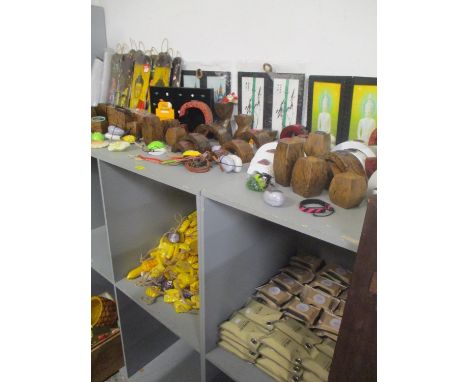 A mixed lot to include soaps, candles, light shades, ornaments, wristbands, rings and other items 
