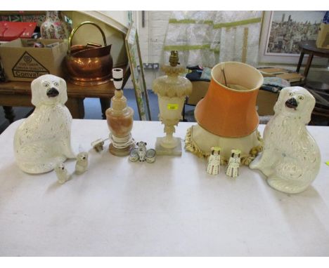 A small onyx side lamp, companion and shades, and a pair of small Staffordshire figures, a pair of Staffordshire dogs A/F and