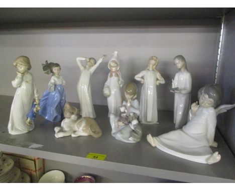 Six mixed Lladro figures, together with three Nao figures 