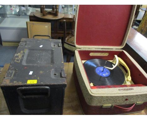 A Dynatron Studio record player, together with an ammunition box 