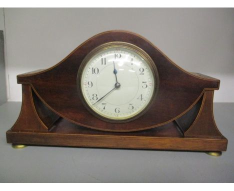 An Edwardian mahogany mantle clock fitted with a French 8 day movement, 6" x 11 1/4" 