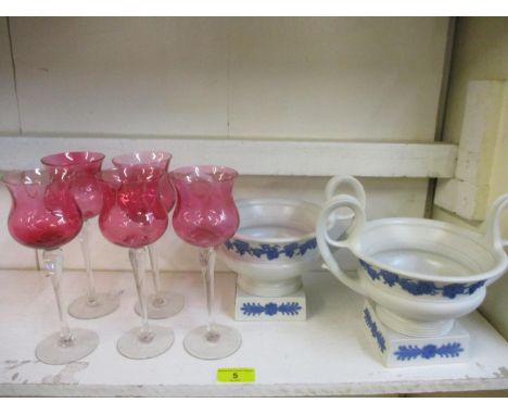 A pair of late 19th/early 20th century Wedgwood twin handled pedestal pots, together with six rose coloured wine glasses 