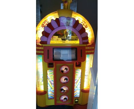 POP MUSIC, The Beatles, a full-size Beatles Yellow Submarine jukebox, with yellow plastic body, bubbling tubes, film scenes &