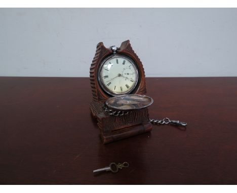 A silver cased pocket watch, Roman numerated chapter ring with subsidiary sweep, London 1859, with silver watch chain in a tr