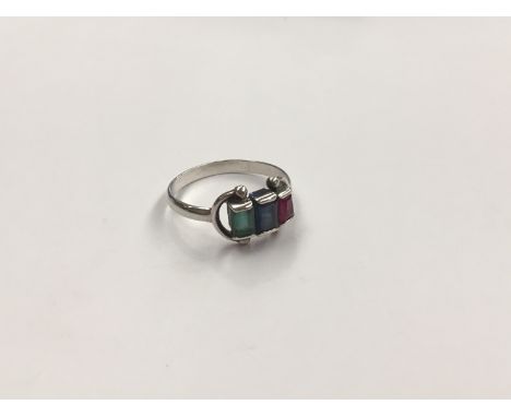 An emerald, sapphire and ruby ring