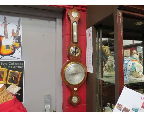 A Victorian rosewood onion top five dial 8" wheel barometer, circa 1860