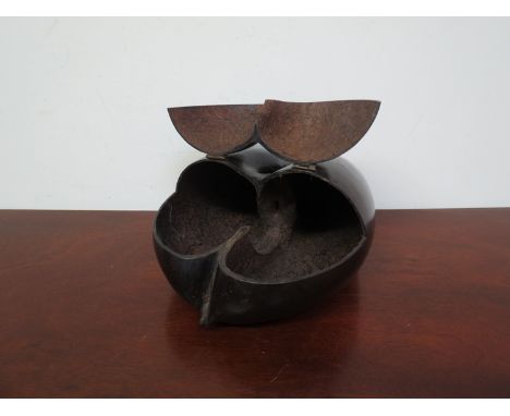 A 19th Century Coco de mer in the form of a tea caddy, primitive  brass and copper hinges 
