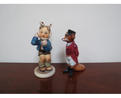 A Doulton figure D6448 huntsman, fox and Goebel figure boy with toothache 