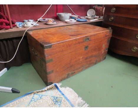 A late 19th Century camphor wood campaign trunk with brass banding 