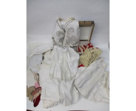 Early 20th century children's clothes to include skirts, a dress with embroidered ornament, a dressing gown, under garments, 