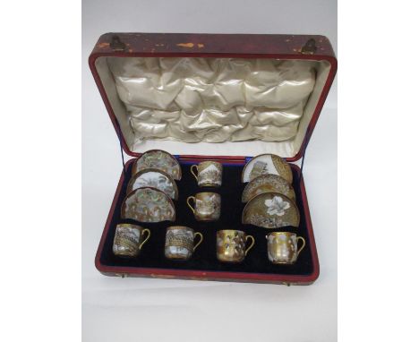 A late 19th century Japanese Kutani porcelain teaset decorated with figures, dragons and landscapes, comprising of six cups, 