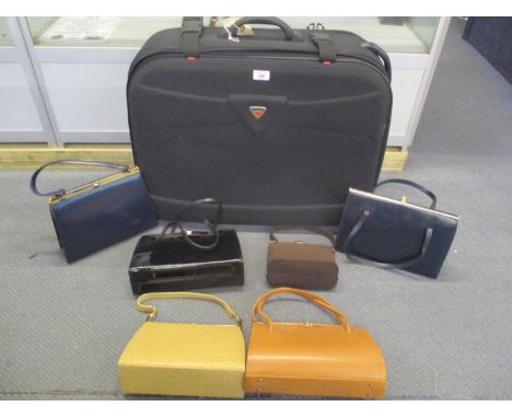 A selection of mixed vintage ladies handbags, together with an Antler suitcase 