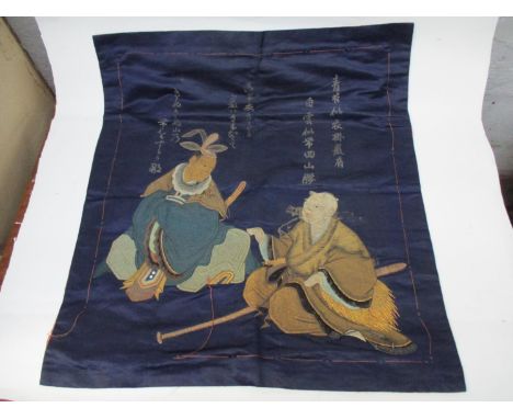 A 19th century Japanese silk embroidery with two poets and inscription, translated to Green Moss Like Clothed Cliff, Light Cl