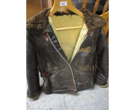 A vintage leather and sheepskin flying jacket 