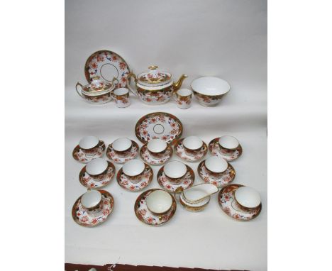 An early 19th century Spode Imari style patterned part teaset decorated with flowers and shapes, numbered 1645, comprising of