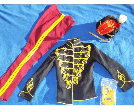A military uniform, 11th Hussars, (the Charge of the Light Brigade) comprising tunic, busby (size 7 + 1/8th)  with plume, tro