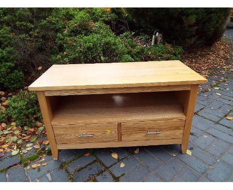 A good quality light wood cabinet incorporating twin drawers, 60 cm x 104 cm x 47 cm 