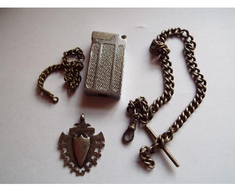 A hallmarked silver chain and T-bar with hallmarked silver fob, and a white metal cigarette lighter