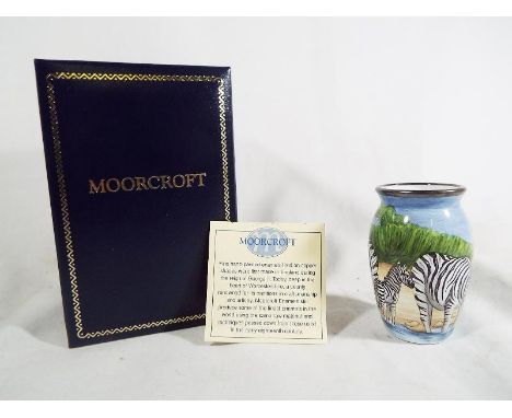 A Moorcroft fine handpainted enamel decorated with depictions of zebras in original box 6.2 cm (h)

