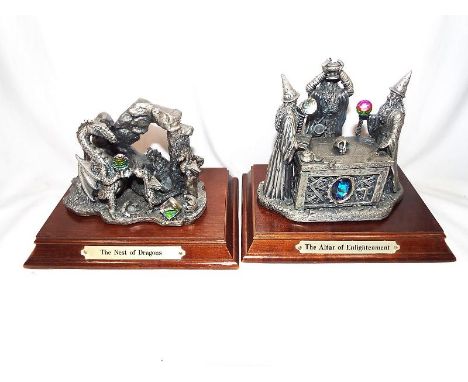 Two Myth and Magic pewter figurines on wooden plinths entitled The Nest of the Dragons and The Altar of Enlightenment (2)