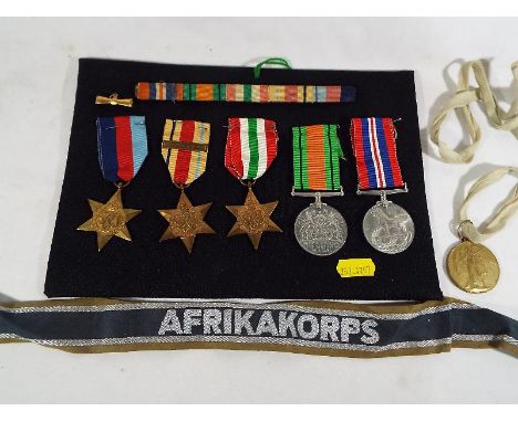 A World War Two (WWII) medal group comprising 1939-1945 Star, Africa Star with 1st Army bar, Italy Star, Defence medal and Br