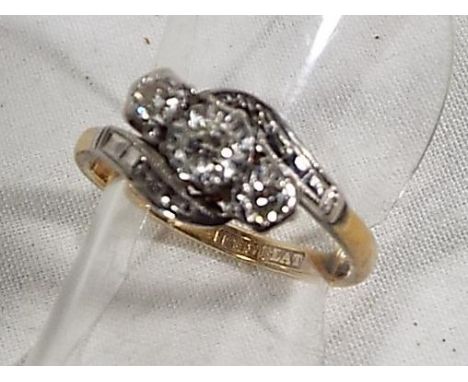 A lady's 18 carat gold and platinum ring set with diamonds, size K and a half, approx weight 2.9grams (all in)