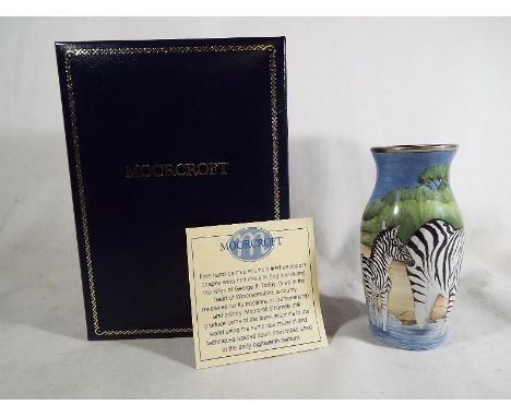 A Moorcroft fine handpainted enamel decorated with depictions of zebras in original box 9.2 cm (h)

