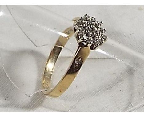 A lady's hallmarked 9 carat yellow gold cluster ring, size M and a half, approx weight 1.89grams (all in)