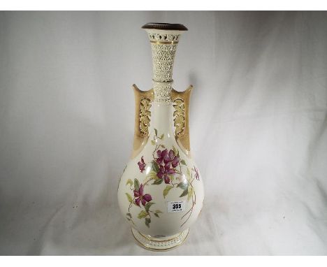 A Royal Worcester early 20th century Persian style large porcelain blush ivory twin-handled vase, the pear shaped body decora