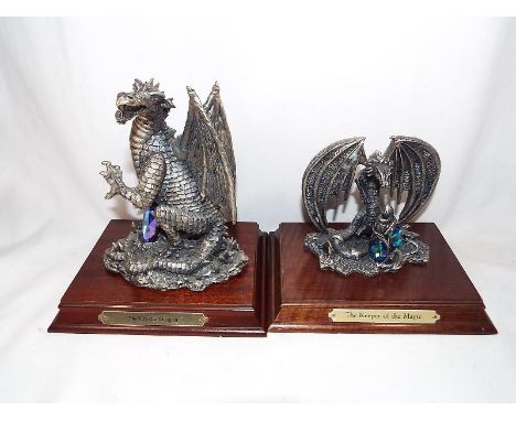 Two Myth and Magic pewter figurines on wooden plinths entitled The Crystal Dragon and The Keeper of the Magic estimate £60 - 
