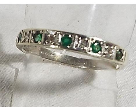 A lady's hallmarked 9 carat yellow gold ring set with diamonds and emeralds, size R, approx weight 2.47grams (all in)