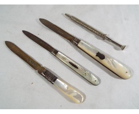 Three hallmarked silver knives with mother of pearl handle and a white metal swizzle stick