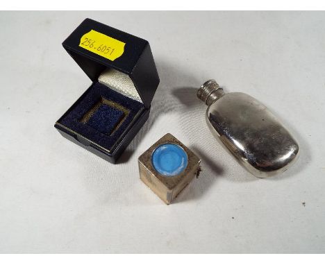 A hallmarked silver snooker / billiards chalk holder, Birmingham assay, cased and a white metal spirit flask in leather holde