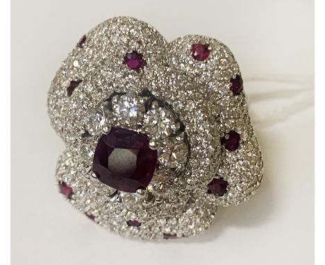 18CT WHITE GOLD RING - CENTRE STONE NATURAL RUBY,APPROX 1CT DIAMOND - TOTAL BETWEEN 4-5 CARATS- SIZE M - 19 GRAMS APPROX