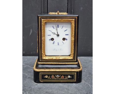 A late 19th century ebonized and brass mantel clock, the enamel dial inscribed 'Leroy a Paris', 24cm high, with pendulum.