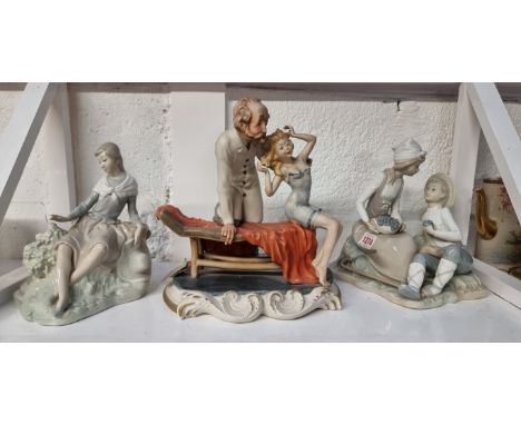 Two Nao figure groups,&nbsp;largest 20.5cm high; together with another Capodimonte&nbsp; example, 26.5cm high. (3)
