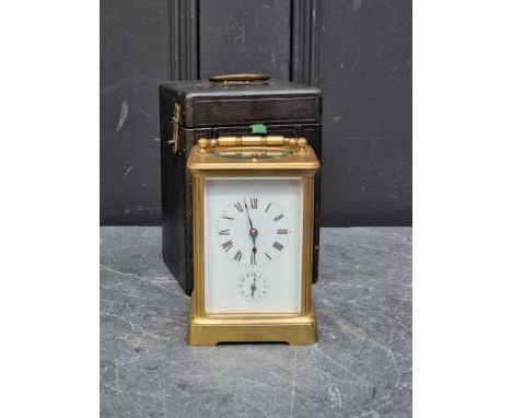An early 20th century French brass carriage clock, with twin hammer strike on single gong, with alarm and push button repeat,