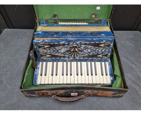 A vintage Geraldo piano accordion, cased.