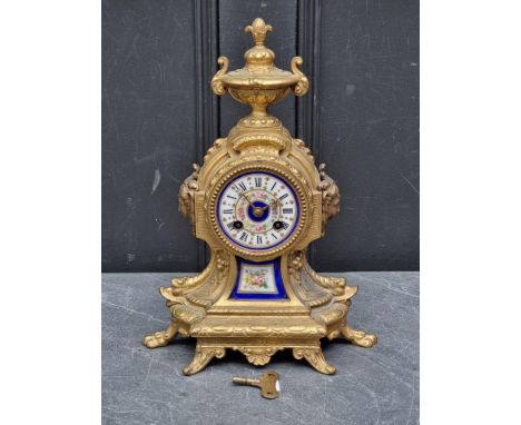 A late 19th century Louis XVI style gilt metal and porcelain mantel clock,&nbsp;the movement inscribed 'Japy Freres', 33.5cm 