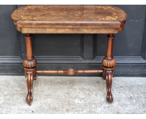 A Victorian rosewood and inlaid card table, 92cm wide.