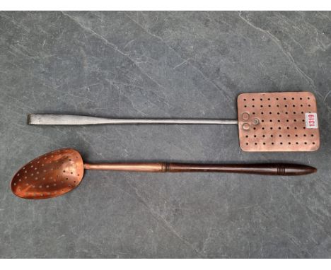 Kitchenalia: a large 19th century copper strainer spoon, with turned wood handle, 53cm long; together with another 19th centu